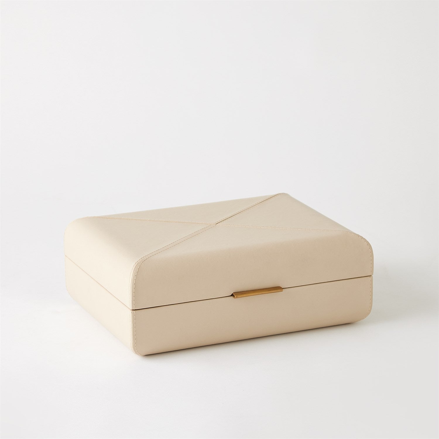Beige jewelry box with a gold clasp on a white background