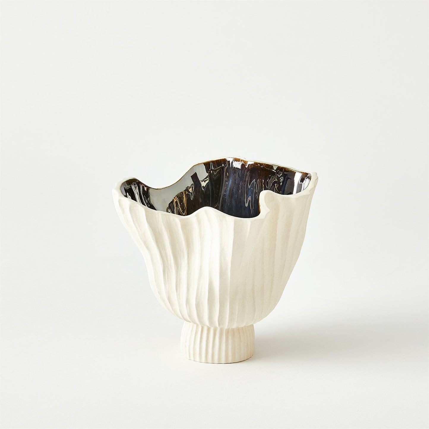 White ceramic vase with black interior on a white background