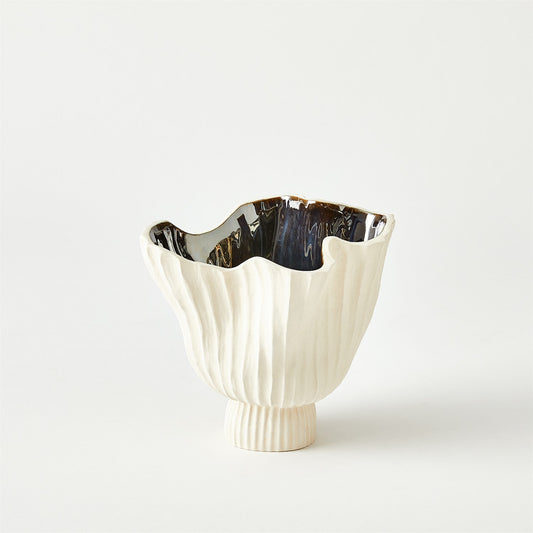 White ceramic vase with black interior on a white background