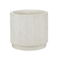 A cylindrical concrete planter pot with a textured vertical ribbed pattern and a small flared base, shown on a plain white background.