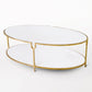 Gold-framed glass coffee table on a white background