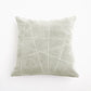 Decorative pillow with geometric pattern on a white background