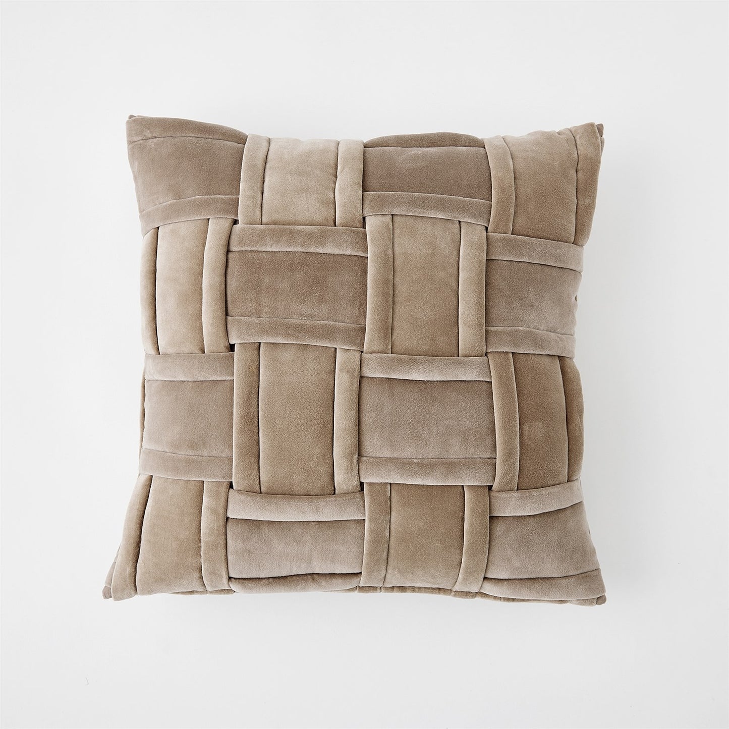 Beige woven pillow on a white background