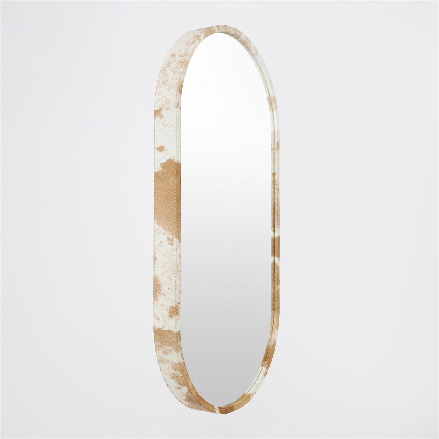 Round mirror with a decorative frame on a white background