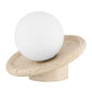 White spherical object on a beige stone-like base against a white background
