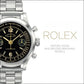 Rolex watch with black dial and silver case on a white background