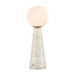 Table lamp with a white base and round glass shade on a white background