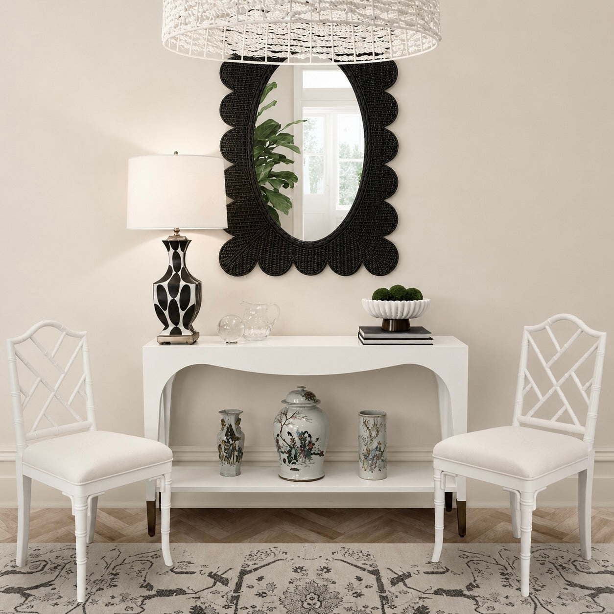 Decorative console table with mirror, chairs, and decorative items in a room.