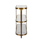 Two-tiered side table with gold frame and white top on a white background