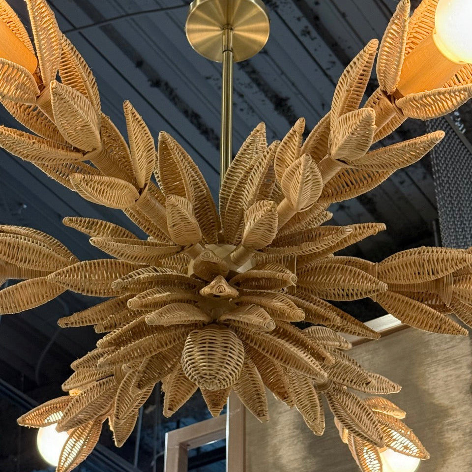 Gold leaf chandelier hanging from the ceiling