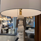 Decorative lamp with a textured base in a store setting