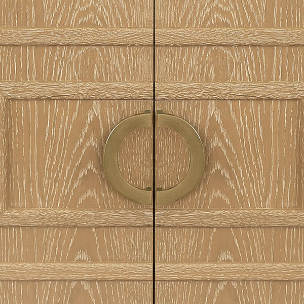Wooden cabinet with a gold circular handle