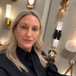 selfie with sconces in the background