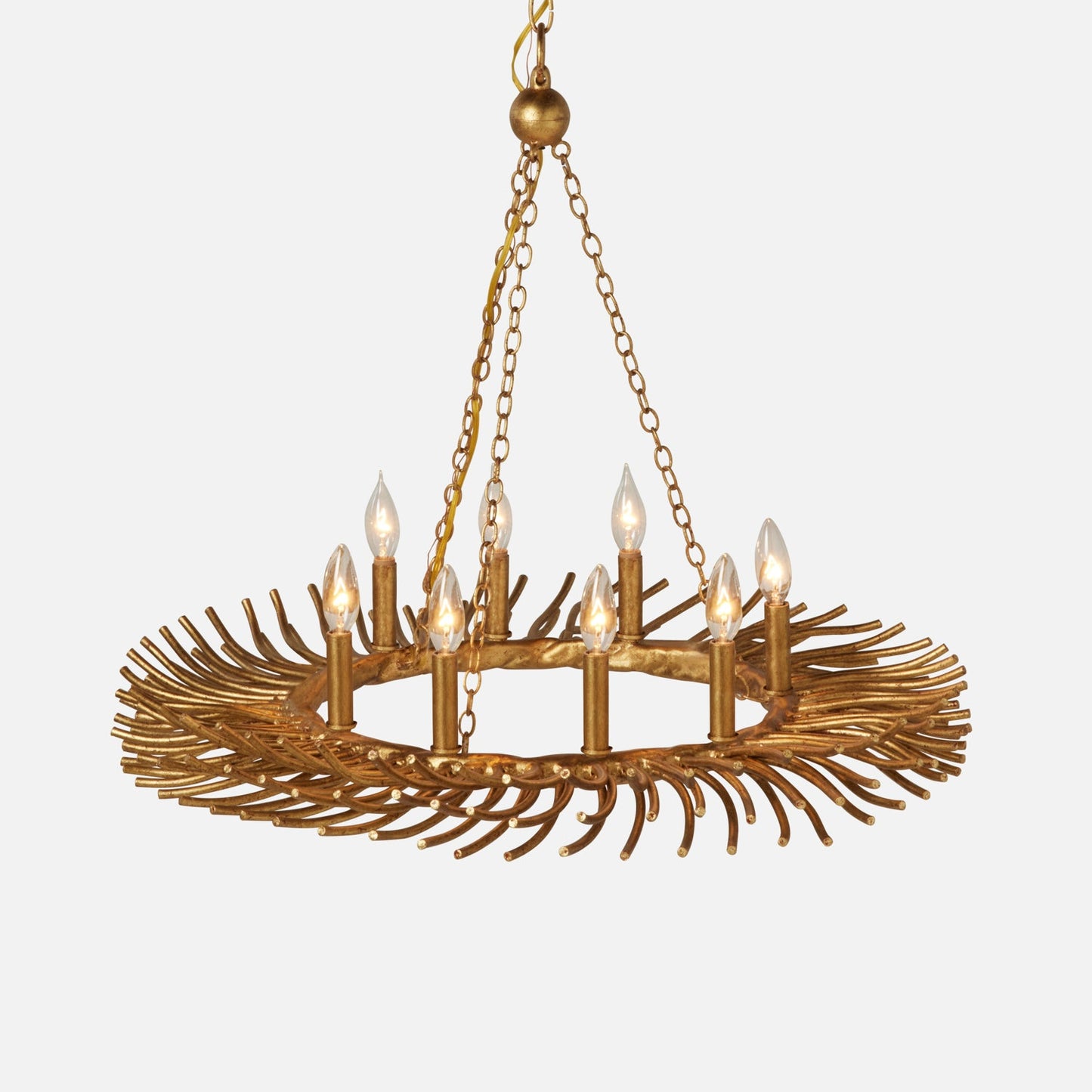 Gold chandelier with candle-style lights on a white background