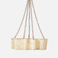 Gold mesh pendant light with chain on a white background