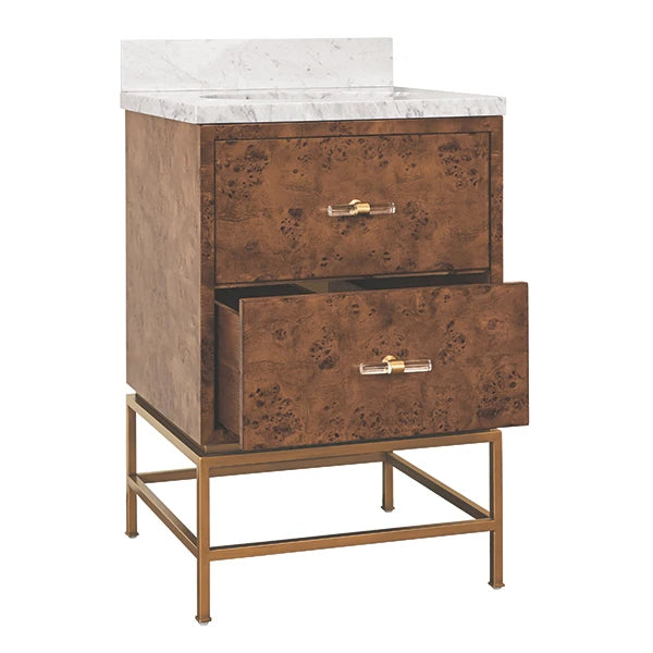 A two-drawer vanity cabinet with a white marble top, textured brown burl wood drawer fronts, and a gold metal frame base, shown on a plain white background.