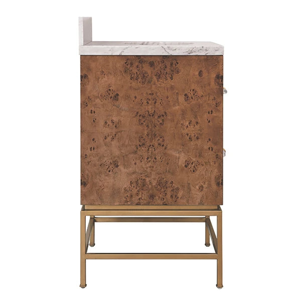A modern bathroom vanity cabinet with a white marble top, a copper-brown burl wood front, and a gold metal stand, shown against a plain white background.