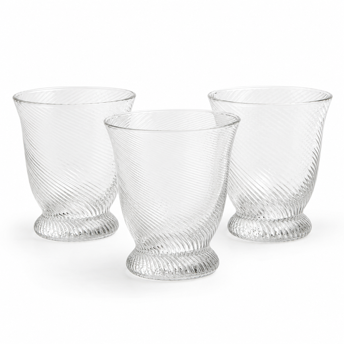 3 clear ribbed glasses on a white background