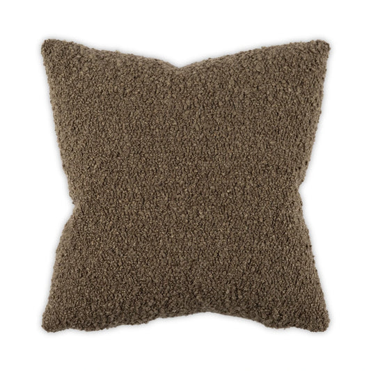 Brown textured pillow on a white background
