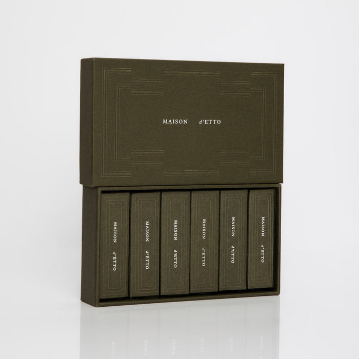 Set of six green boxes with 'Maison Etto' branding on a white background