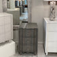 Gray dresser with silver knobs in a showroom setting