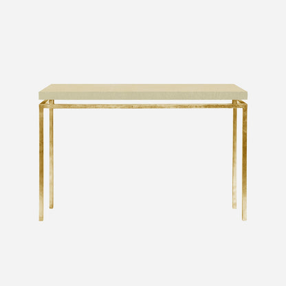 A modern console table featuring a ivory faux shagreen rectangular top and a slim, brushed gold metal frame with legs and a horizontal apron bar, shown against a plain light gray background.