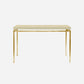 A modern console table featuring a ivory faux shagreen rectangular top and a slim, brushed gold metal frame with legs and a horizontal apron bar, shown against a plain light gray background.