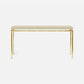 A modern console table featuring a ivory faux shagreen rectangular top and a slim, brushed gold metal frame with legs and a horizontal apron bar, shown against a plain light gray background.