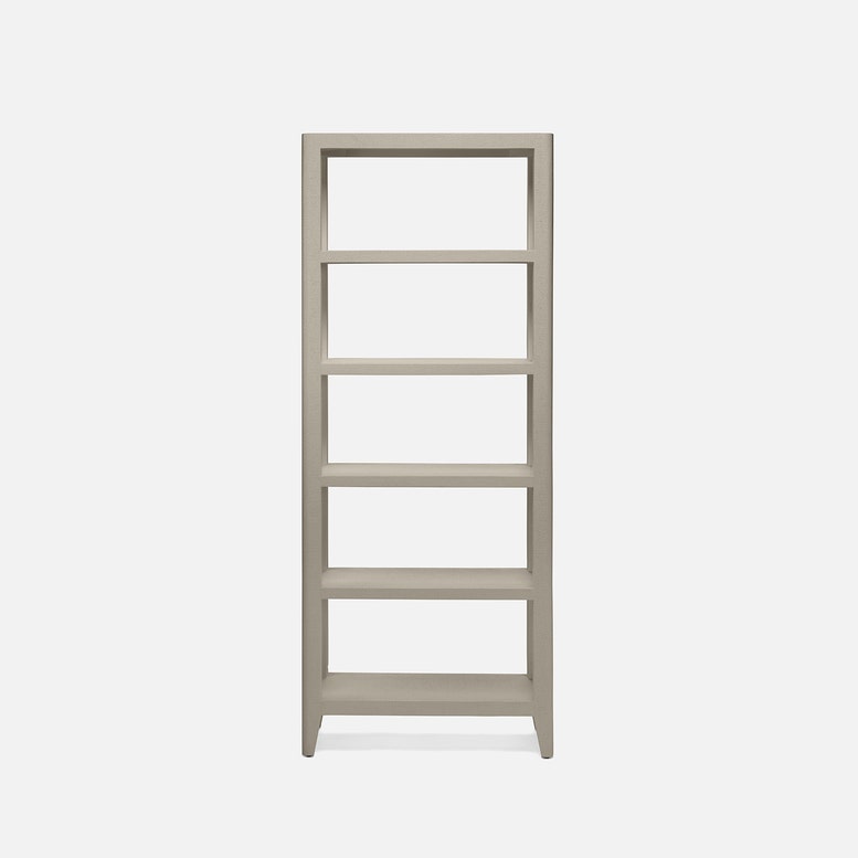 Light gray bookshelf with four shelves on a white background