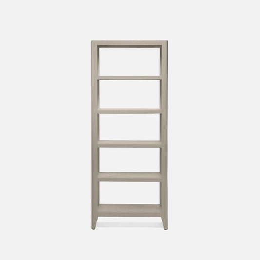 Light gray bookshelf with four shelves on a white background