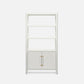 A tall white bookcase with four open shelves and two cabinet doors at the bottom, featuring slim gold-toned handles, shown on a light gray background.