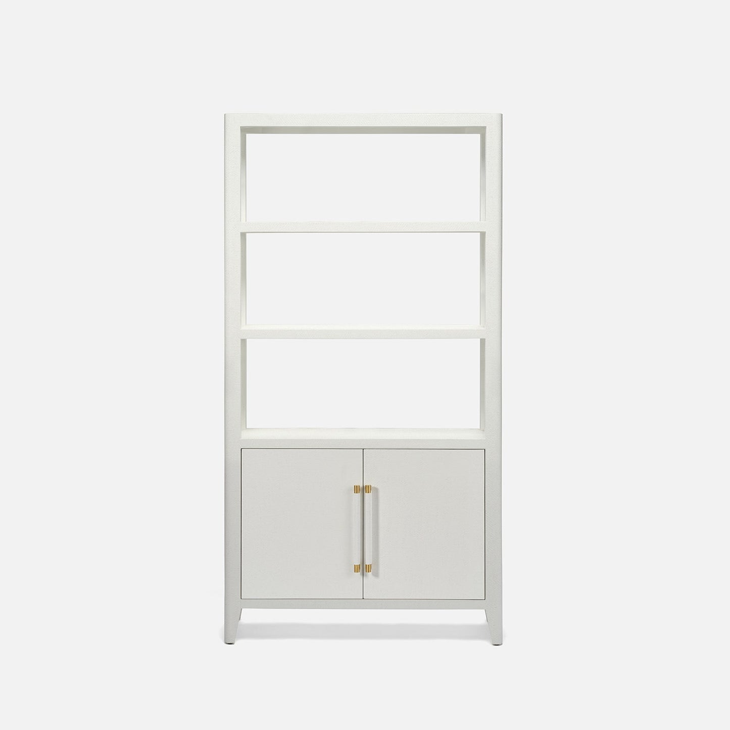 A tall white bookcase with four open shelves and two cabinet doors at the bottom, featuring slim gold-toned handles, shown on a light gray background.