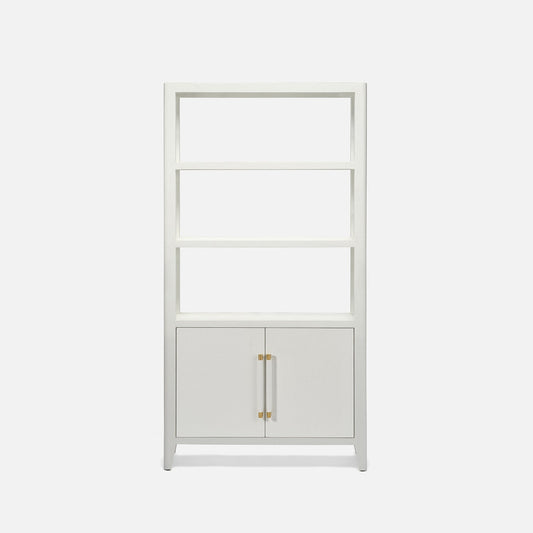 A tall white bookcase with four open shelves and two cabinet doors at the bottom, featuring slim gold-toned handles, shown on a light gray background.