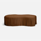 Brown fringed coffee table on a white background