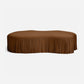 Brown fringed coffee table on a white background