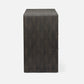 A dark mushroom realistic faux shagreen chest of drawers with a textured finish, featuring five drawers and small brass pull handles, shown against a light gray background.