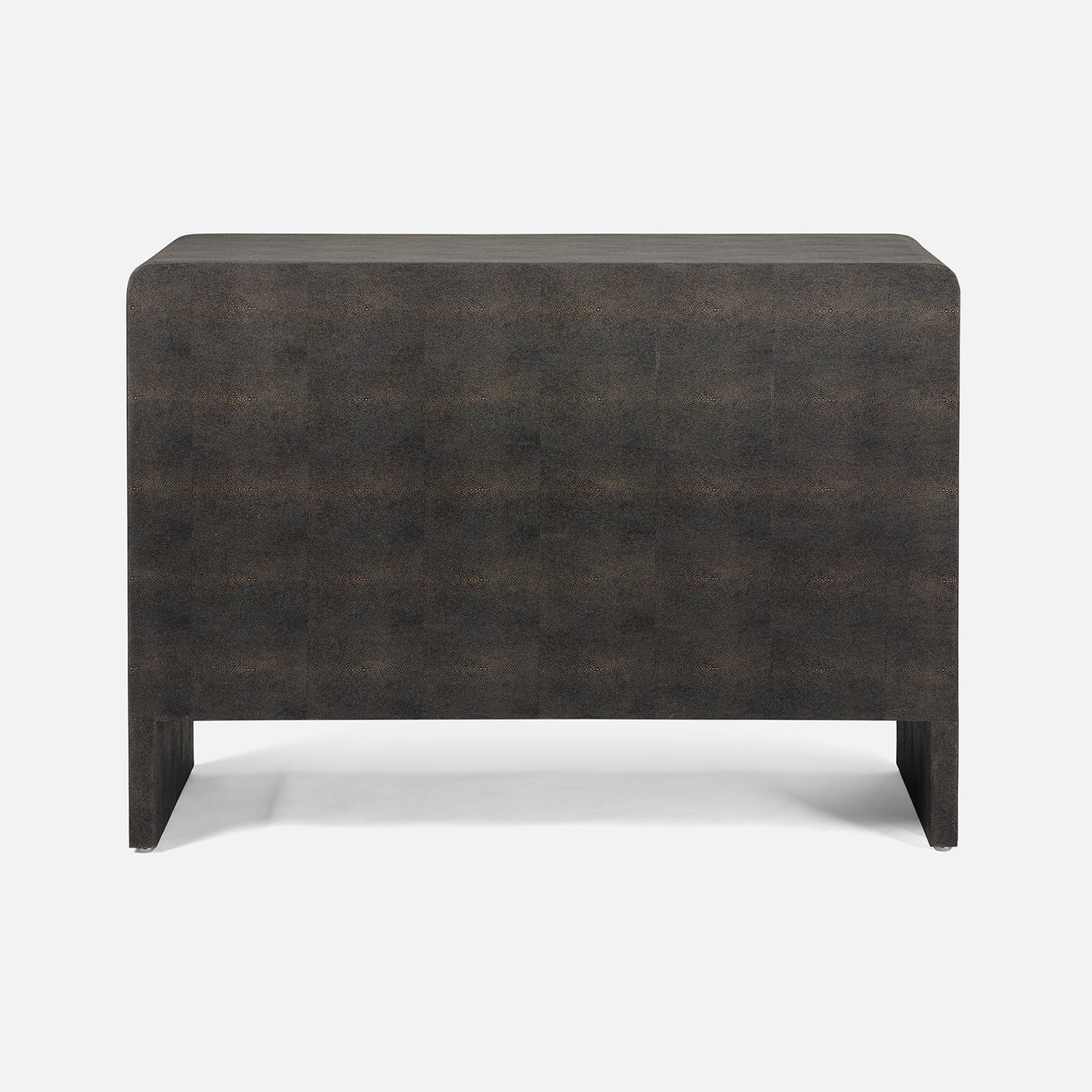 the back of a dark mushroom realistic faux shagreen chest of drawers shown against a light gray background.
