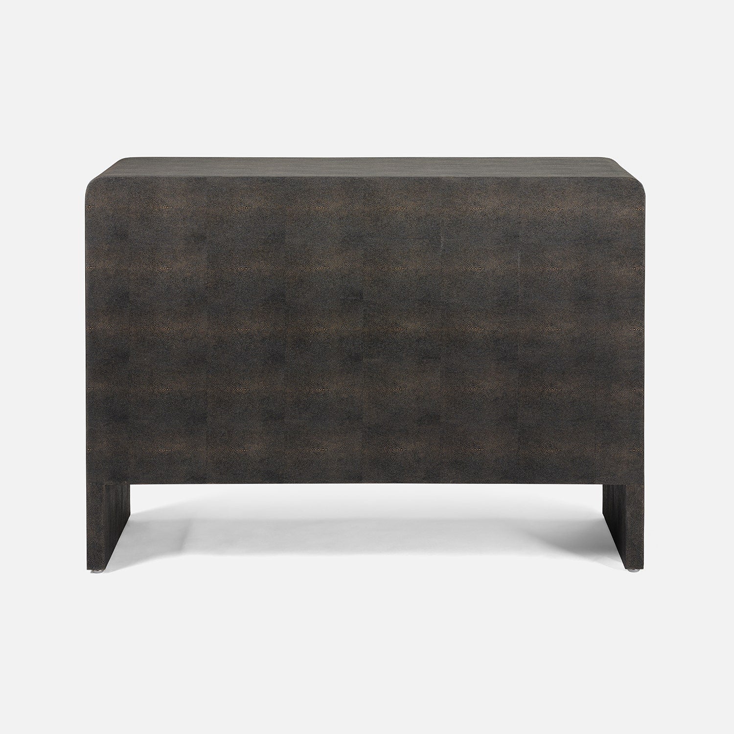 the back of a dark mushroom realistic faux shagreen chest of drawers shown against a light gray background.
