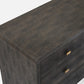 A dark mushroom realistic faux shagreen chest of drawers with a textured finish, featuring five drawers and small brass pull handles, shown against a light gray background.