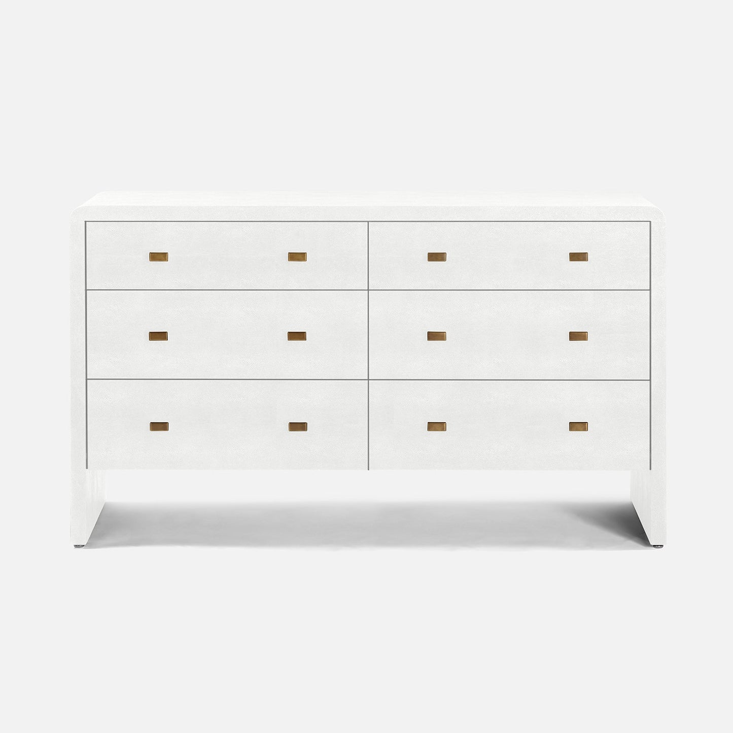 A white six-drawer dresser with small rectangular gold pull handles, shown against a plain white background.