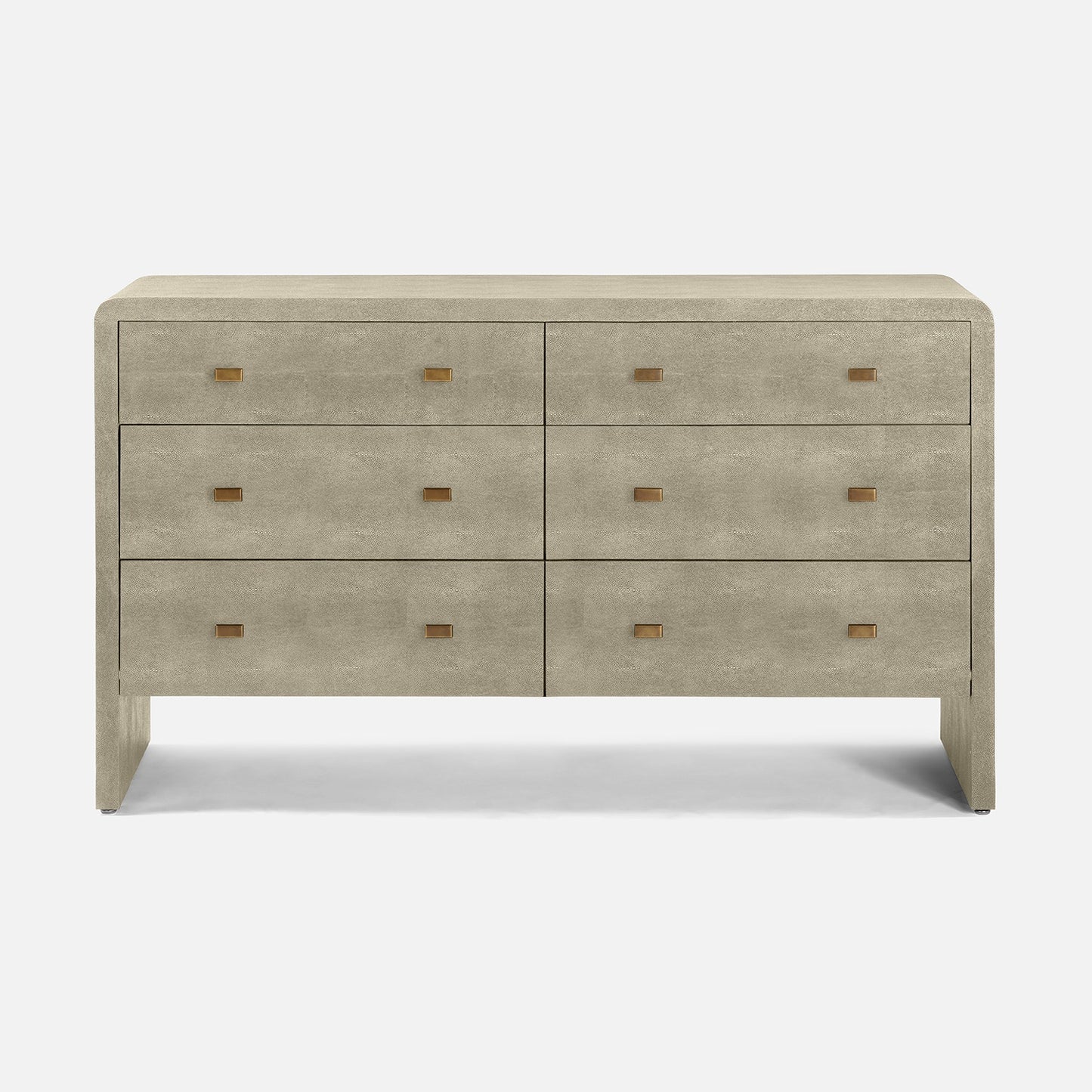 sand faux shagreen dresser with six drawers on a white background
