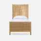 Wicker bed with white mattress on a white background
