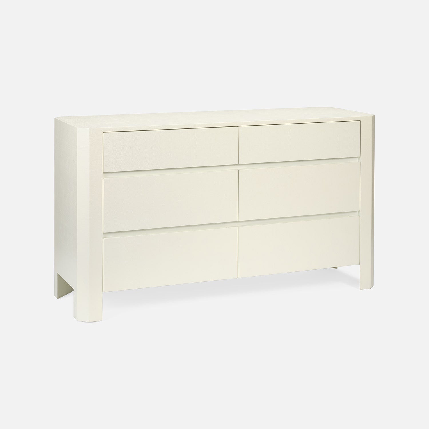 White dresser with four drawers on a white background