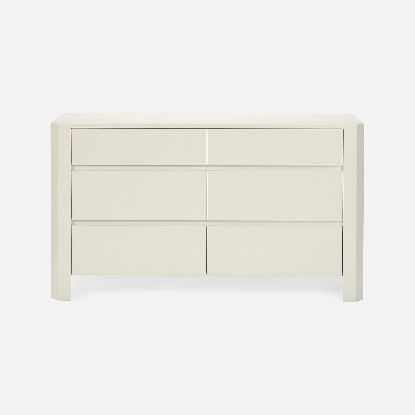 White dresser with multiple drawers on a white background