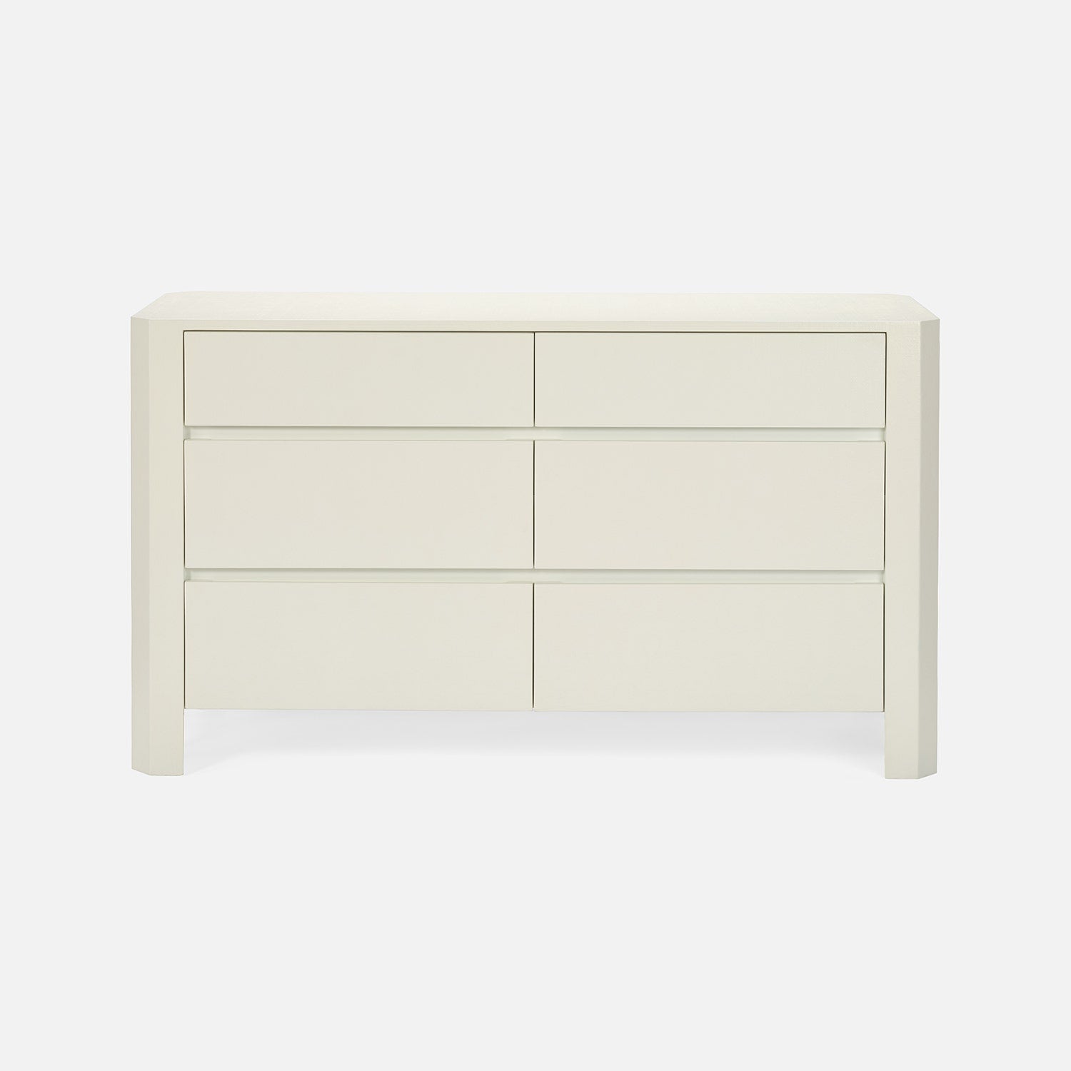 White dresser with multiple drawers on a white background