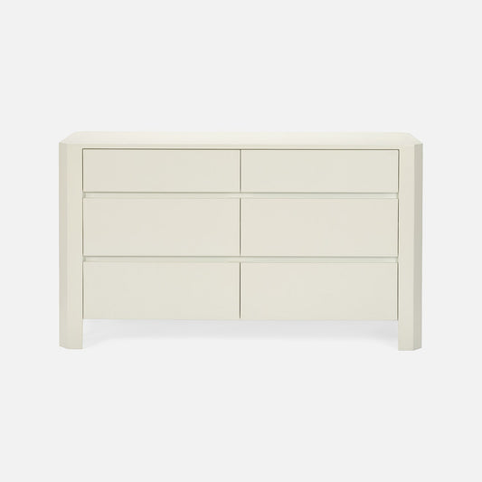 White dresser with multiple drawers on a white background