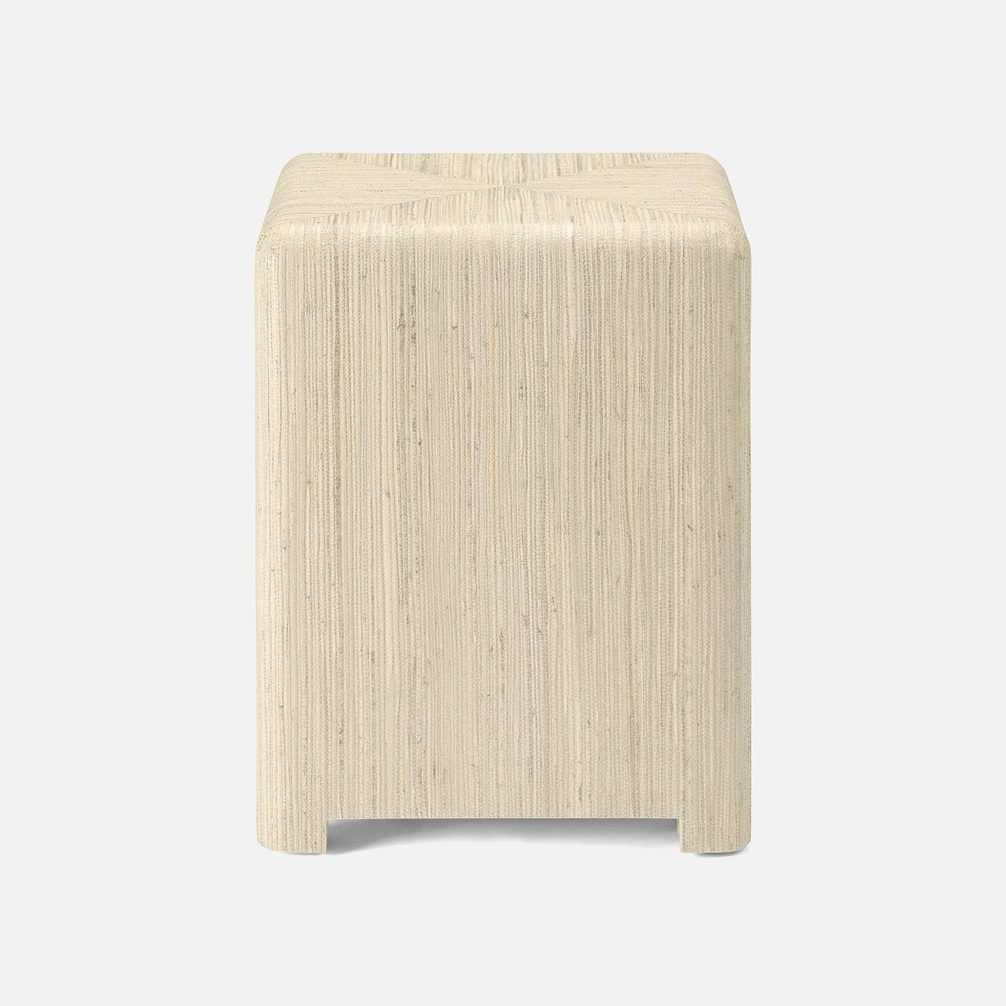 Beige stool with a textured surface on a white background