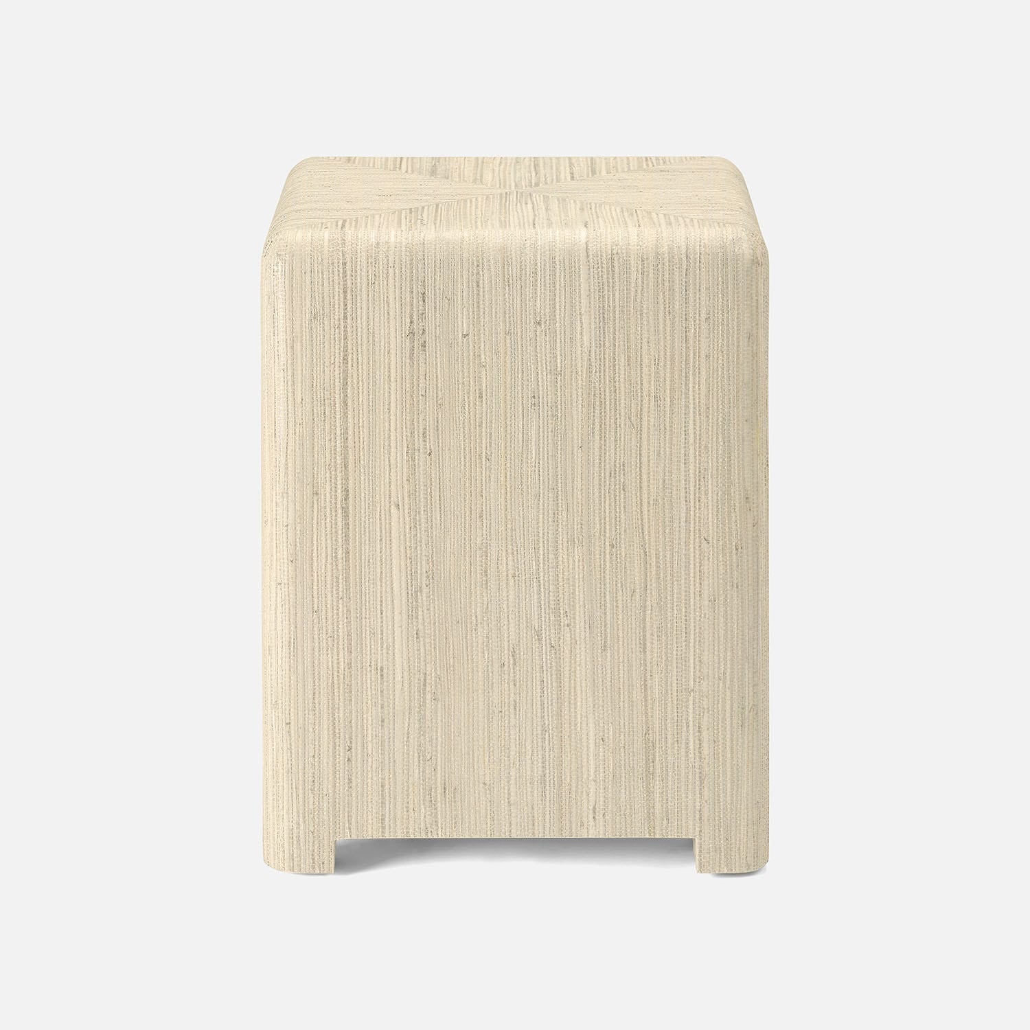 Beige stool with a textured surface on a white background