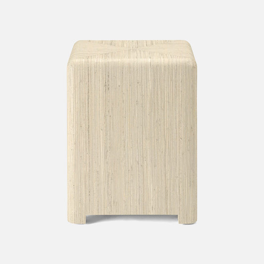 Beige stool with a textured surface on a white background