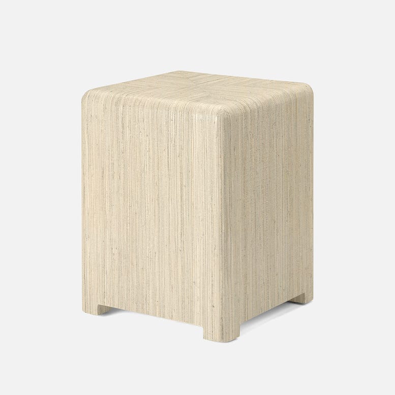 Beige woven stool on a white background